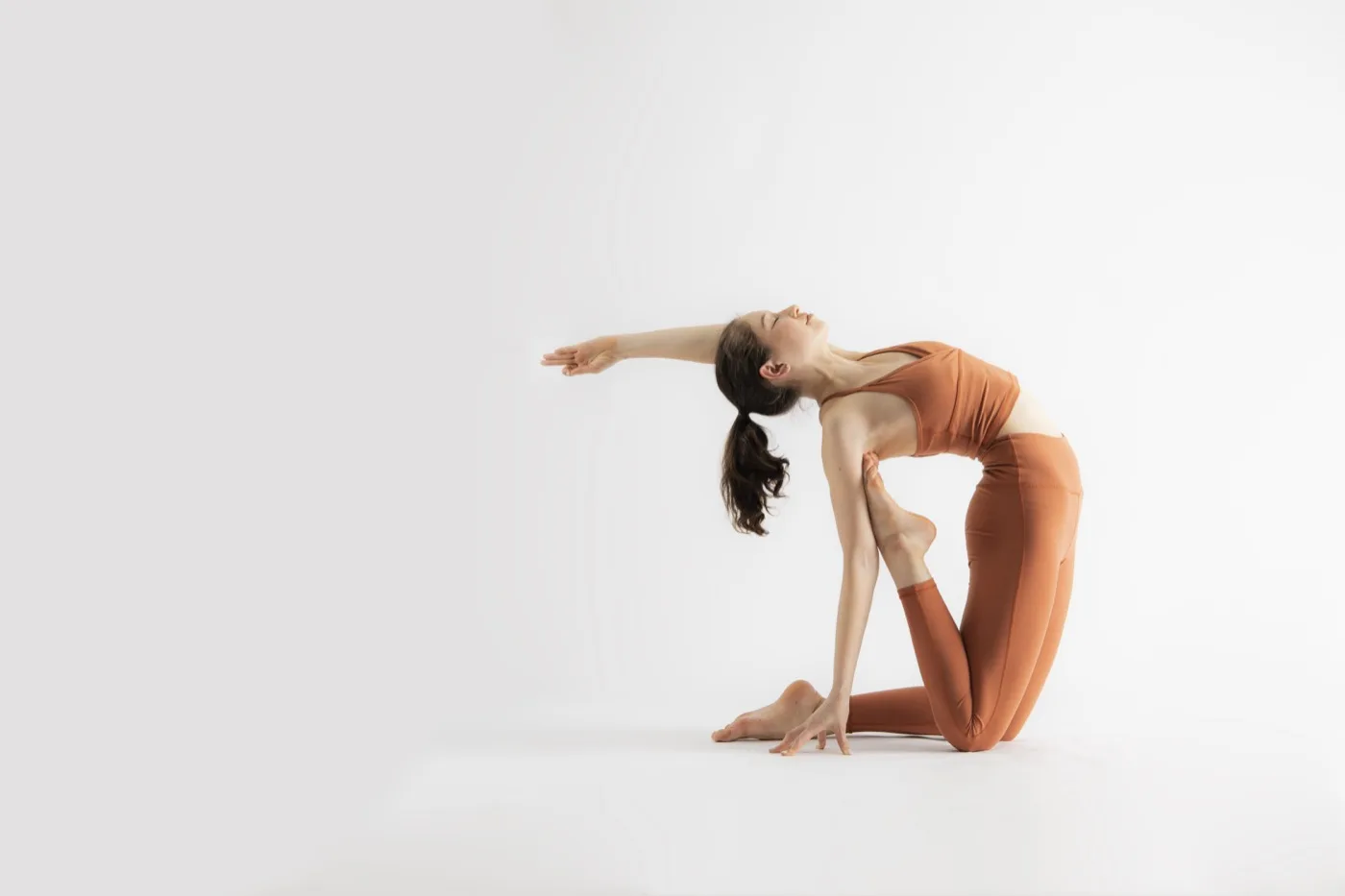 Alexandra Colgan in a camel pose backbend.