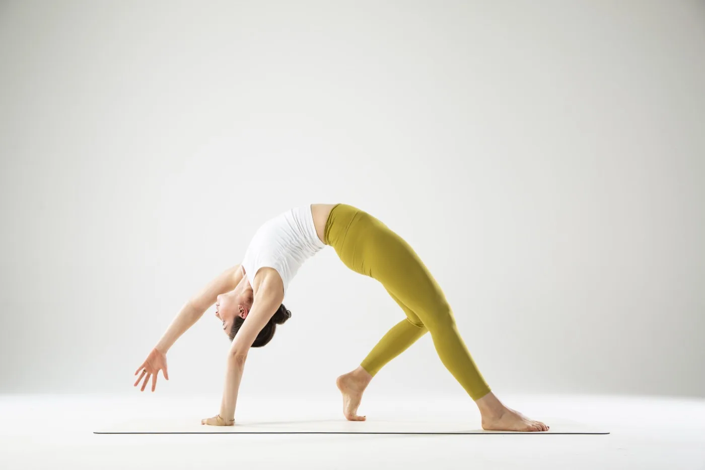 Alexandra Colgan in a wild thing backbend.